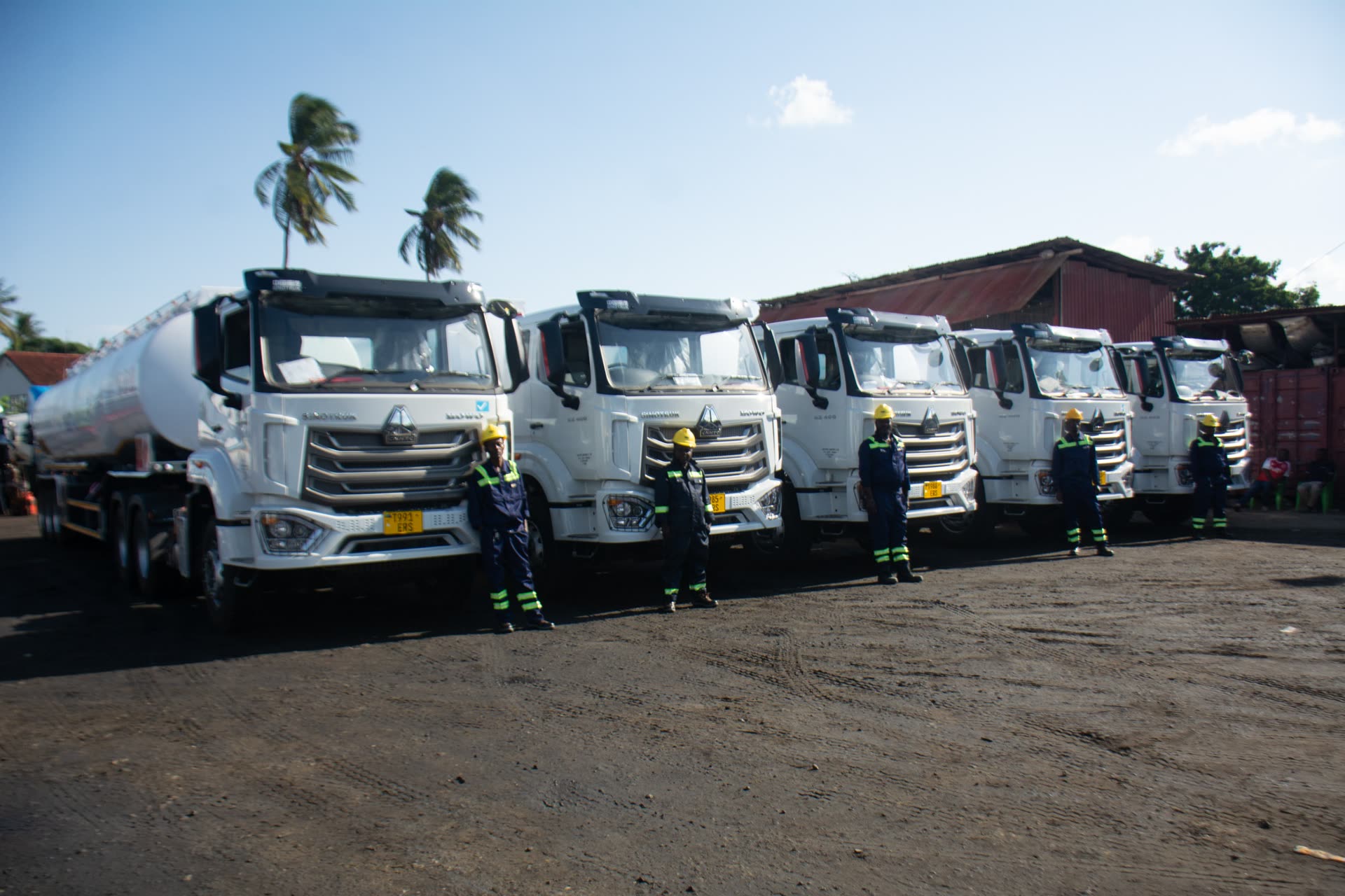 Veltra Energy fuel tanker fleet lined up with drivers